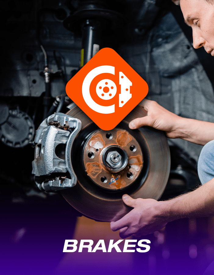 Brakes Tyres & More technician working on brakes , replacing brake pads and brake discs.